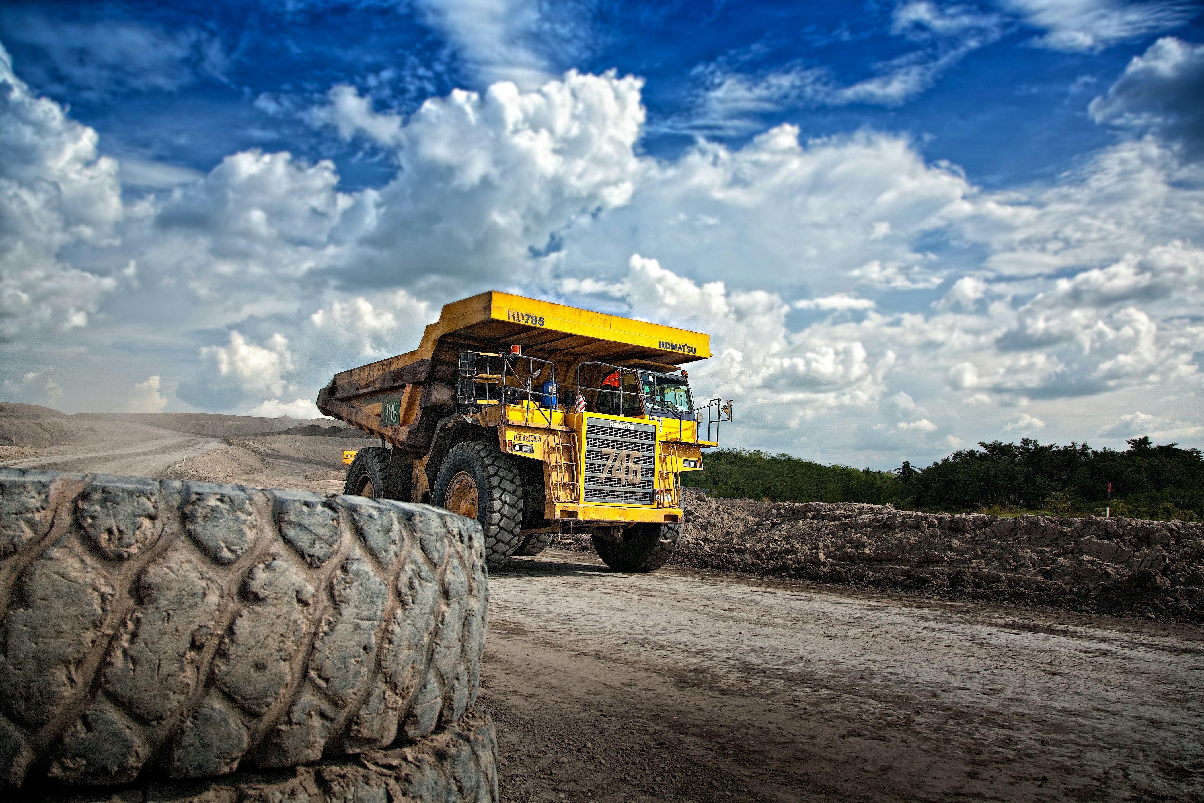 Komatsu haul truck under cloud